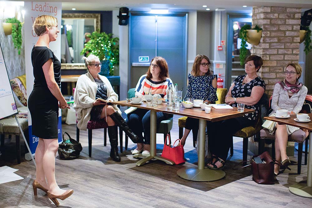 Audience listening to Antoinette Dale Henderson delivering a masterclass worksop on leading with gravitas